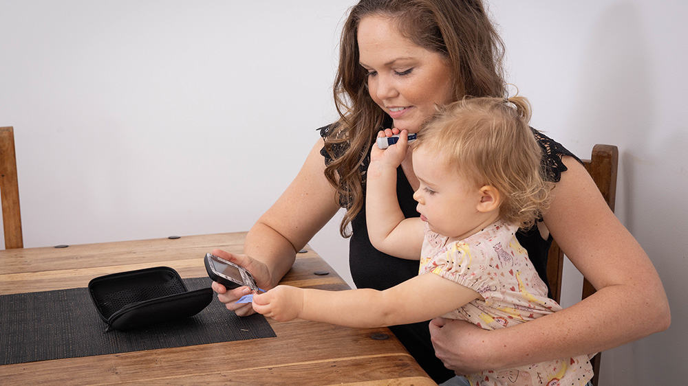 Tanya with her young daughter
